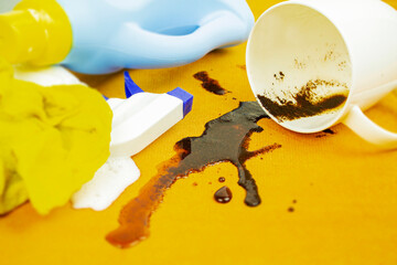 A spot on a light fabric, tablecloth, sofa. Washing, cleaning the fabric