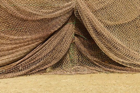 draped fishing nets in the fishing village of Rümeli Feneri