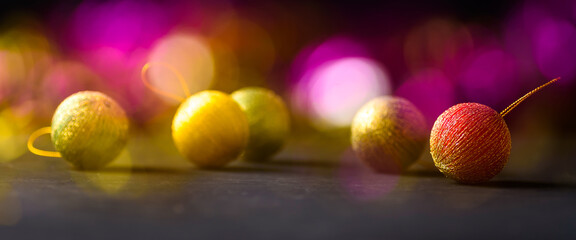 New year balls and sparkling lights blurred bokeh background