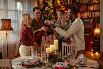 Group of people toasting for Christmas