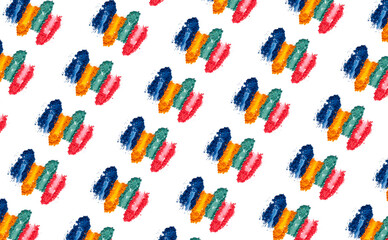 Flat lay of Broken bright multicolor eyeshadow as samples and swatches of cosmetic beauty product isolated on white background.