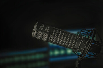 Professional microphone and sound mixer in radio station studio