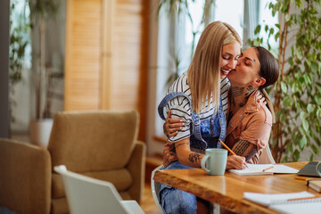 Happy lesbian women in love embracing