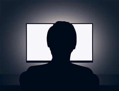 Vector illustration of man sits in front of a blank monitor in dark room