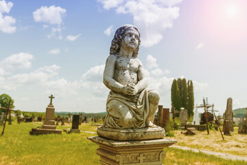 Fototapeta na wymiar Angel child in prayer. (concept: child loss, death of a child).