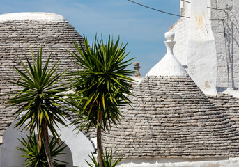 Stone roofs of Trulli Houses in Alberobello; Italy. The style of construction is specific to the...