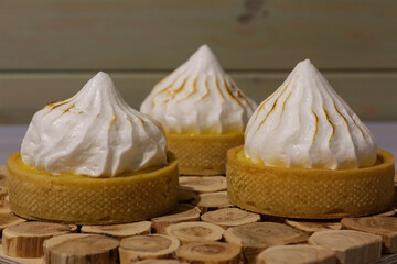 Lemon cakes with whipped cream. Sweet dessert
