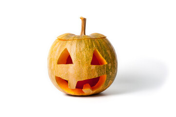 A pumpkin lantern, a Halloween attribute resembling a head with a frightening or funny face, shot against a white background.