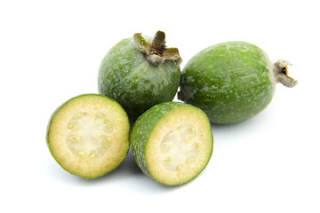 Feijoa fruit or whole and half pineapple guava isolated on white