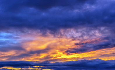 Orange fiery evening sunset sky