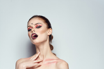 beautiful woman naked shoulders cosmetics bright makeup studio model