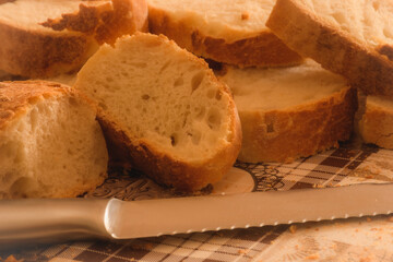 Slices Of Fresh Bread And A Knife