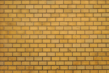 Exterior wall lined with yellow glazed ceramic tiles