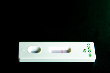 secretions with solution on Antigen Test Kit, in studio Chiangmai  Thailand.