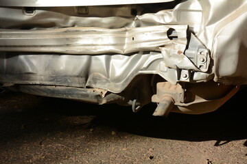 Backside of silver car get damaged by accident