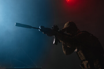 soldier aiming rifle