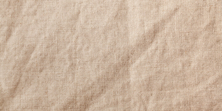 Banner beige textile linen tablecloth in full frame. Cloth texture background. Copy space.