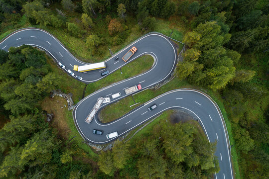 Drone View Of Cars Driving Along Winding Maloja Pass Road