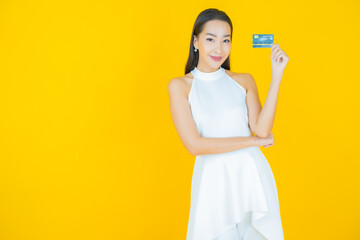 Portrait beautiful young asian woman smile with credit card
