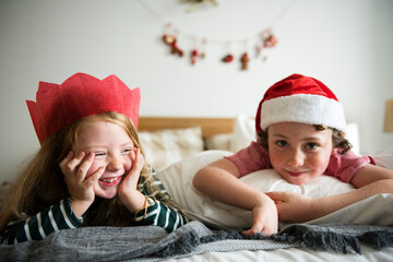 Fototapeta Caucasian kids enjoying Christmas holiday obraz