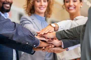 Group of multiethnic business people stacking hands