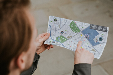 Traveler reading a map