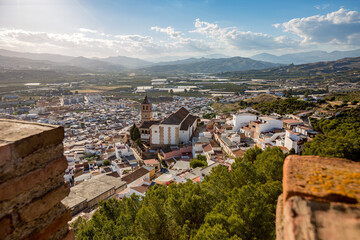 Fototapeta na wymiar Street panorama view from the old castle tower on the hill, Vélez-Málaga, Andalusia, Spain. 