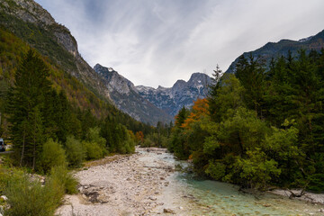 Fototapeta na wymiar landscape in Triglav National Park in late autumn with colorful foliage and the Soca River in the foreground
