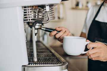 Barista preparing coffee at a coffee shop