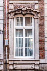 Fototapeta na wymiar Detail from an ornate European style window of a historical building