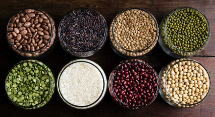 Various types of beans in  glass bowls