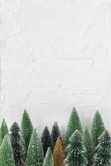 Golden pine tree among green pine trees