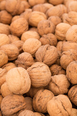 Lots of walnuts. Walnut on the counter of the market.