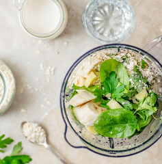 Fresh fruits and vegetables in a smoothie blender