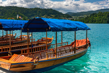 Colorful Wooden Boats on Lake Bled in Slovenia. Famous Tourist Attraction