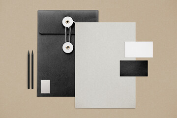 Stationery set with string envelope folders, business cards, and pencils