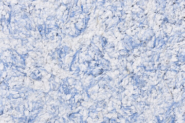 Abstract textured wallpaper. Decorative texture. Colored texture of liquid wallpaper to cover wall surface. Colored abstract background. Abstract texture of decorative plaster liquid wallpaper