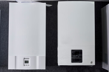 Dual-circuit gas boiler. Gas boiler for home heating. Wall double-bithermic boiler for heating and hot water