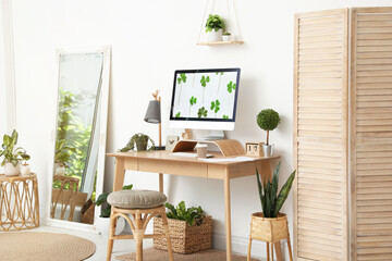 Stylish room interior with comfortable workplace. Home office