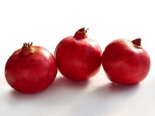 red,juicy pomegranats fruits close up