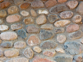 Texture of a stone wall. Old castle stone wall texture background. Part of a stone wall, for background and texture.