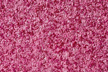Abstract textured wallpaper. Decorative texture. Colored texture of liquid wallpaper to cover wall surface. Colored abstract background. Abstract texture of decorative plaster liquid wallpaper