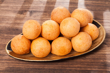 Buñuelo; Traditional Food Colombian - Deep Fried Cheese Bread, Photo On Wooden Background