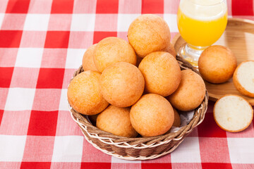 Traditional Food Colombian Buñuelo - Deep Fried Cheese Bread Con cold Drink