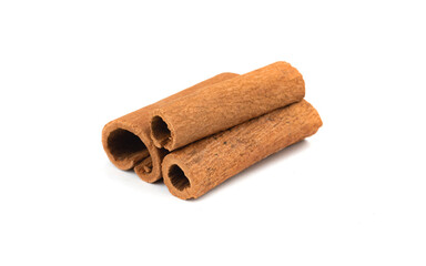 Close-up view of cinnamon sticks isolated on a white background photo