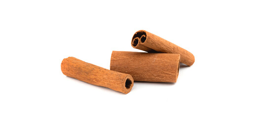 Cinnamon sticks isolated on a white background, banner