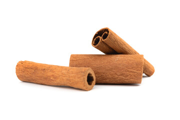 Three cinnamon sticks isolated on a white background photo
