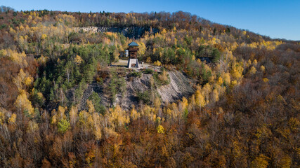 Aerial view of lookout tower Haj in autumn forest near Nova Bana, Slovakia