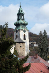 Fototapeta na wymiar Tower of a church, which is a part of the Old Castle in the city Banska Stiavnica in Slovakia, part of the UNESCO heritage site