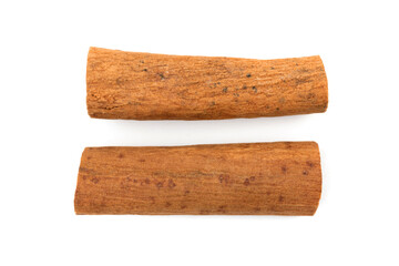 Two cinnamon sticks isolated on a white background photo